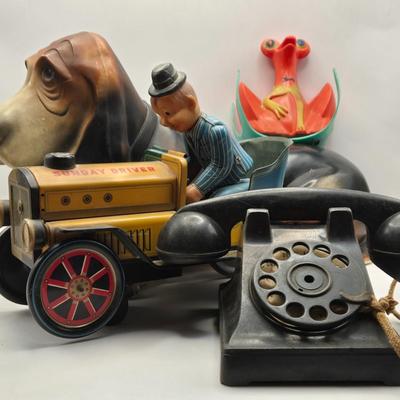 LOT 115K: Vintage Basset Hound Plastic Coin Bank, Modern Toys Sunday Driver, Ideal Toys Telephone, & Tigrett Industries Toy