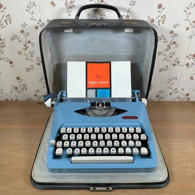 LOT 124Y: Vintage Royal Parade Blue Portable Typewriter