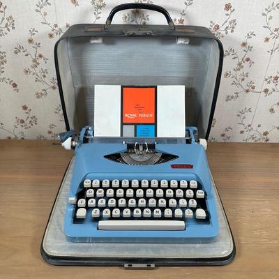 LOT 124Y: Vintage Royal Parade Blue Portable Typewriter