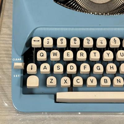 LOT 124Y: Vintage Royal Parade Blue Portable Typewriter