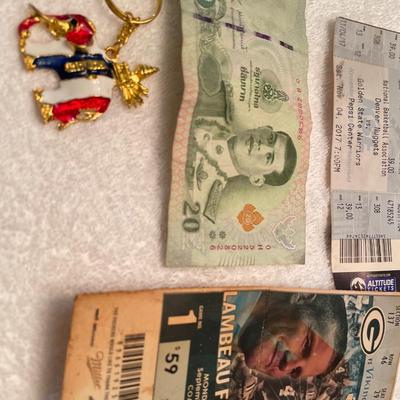 Foreign $, key chain and tickets
