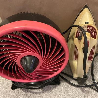 Iron, iron board and small fan