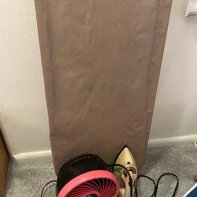 Iron, iron board and small fan