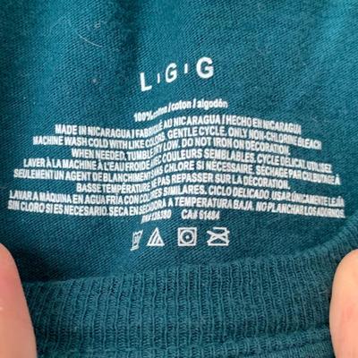 LOT 13 Z: Philadelphia Eagles Clothing Collection; T-Shirts, Jacket, & Collector Towel