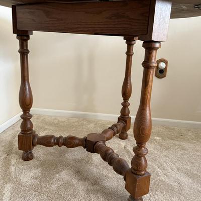 LOT 22L: Pennsylvania House Triangle Drop Leaf Table