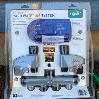 LOT 36G: Lawn and Garden Collection - Orbit Lawn Watering System in Package, Garden Tools, Wooden Hose Holder and More