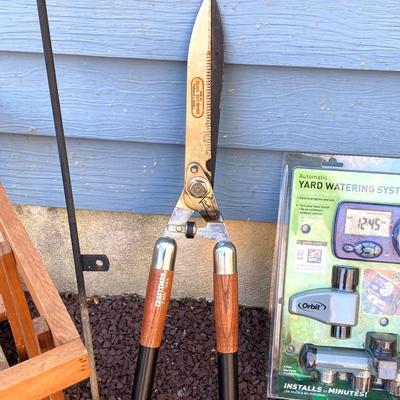 LOT 36G: Lawn and Garden Collection - Orbit Lawn Watering System in Package, Garden Tools, Wooden Hose Holder and More