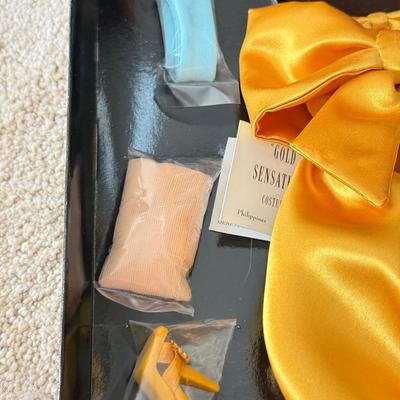 LOT 66L: Ashton-Drake Galleries Mel Odom Gene "Unforgettable" Doll w/ COA & Box (1088) and "Gold Sensation" Costume