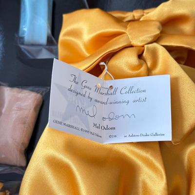 LOT 66L: Ashton-Drake Galleries Mel Odom Gene "Unforgettable" Doll w/ COA & Box (1088) and "Gold Sensation" Costume