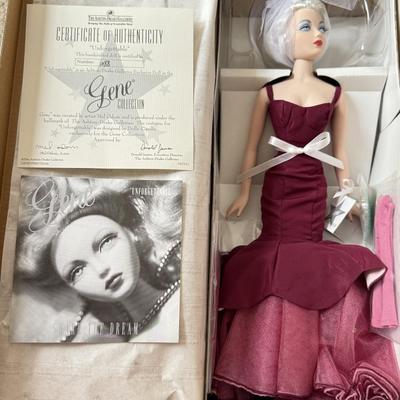 LOT 66L: Ashton-Drake Galleries Mel Odom Gene "Unforgettable" Doll w/ COA & Box (1088) and "Gold Sensation" Costume
