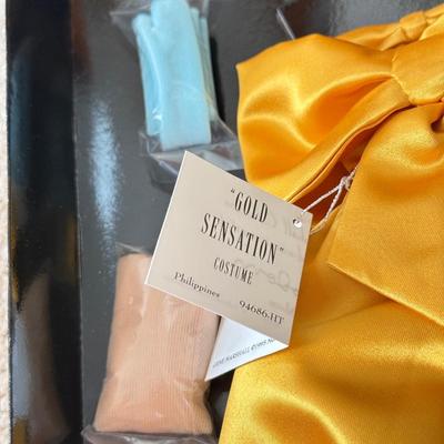 LOT 66L: Ashton-Drake Galleries Mel Odom Gene "Unforgettable" Doll w/ COA & Box (1088) and "Gold Sensation" Costume