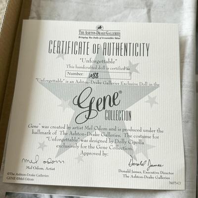 LOT 66L: Ashton-Drake Galleries Mel Odom Gene "Unforgettable" Doll w/ COA & Box (1088) and "Gold Sensation" Costume