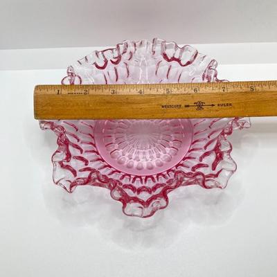 LOT 88K: Collection of Pink Glass - Three Fenton Art Glass Bells, Ribbon Top Basket and Bowl