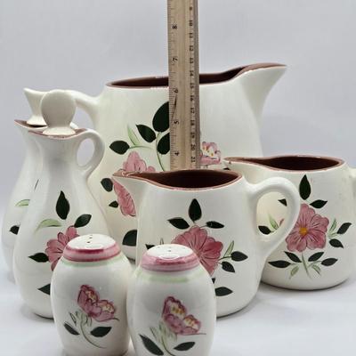 LOT 137K: Stangl Pottery Wild Rose Serving Set Including 1 Large Pitcher, 2 Small Pitchers, Salt and Pepper Shakers, and Vinager and Oil...