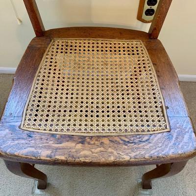 LOT 244 Z: Vintage Hand Carved Cane Seat Chair & Cross Stitched Pillow