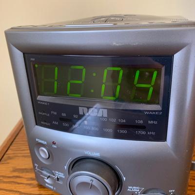 LOT 249 Z: RCA CD Player Clock Radio Model #RP3751A, Coby 12 Band World Receiver Model #CX-CB12, & Radio Shack Handheld AM/FM Radio