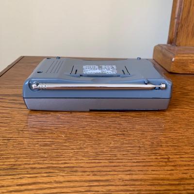 LOT 249 Z: RCA CD Player Clock Radio Model #RP3751A, Coby 12 Band World Receiver Model #CX-CB12, & Radio Shack Handheld AM/FM Radio