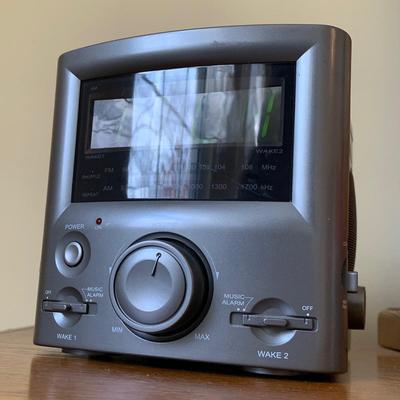 LOT 249 Z: RCA CD Player Clock Radio Model #RP3751A, Coby 12 Band World Receiver Model #CX-CB12, & Radio Shack Handheld AM/FM Radio