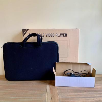 LOT 263 X: NIP Naviskauto Portable DVD Player Model #BM1653B