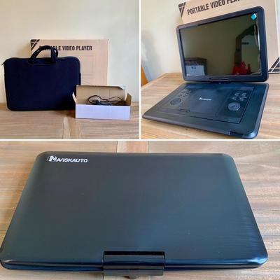 LOT 263 X: NIP Naviskauto Portable DVD Player Model #BM1653B