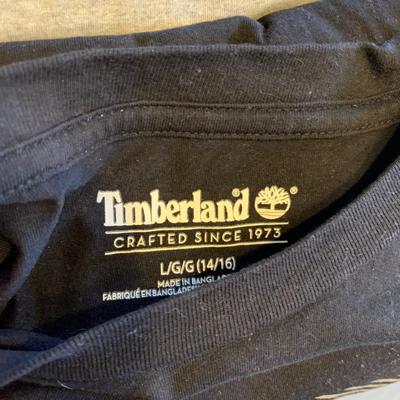 LOT 317 X: Tote of Clothing; Timberland, Champion, Adidas, & More