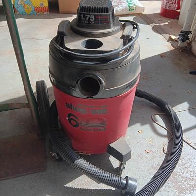 6 GALLON SHOP VAC AND A FURNITURE DOLLY