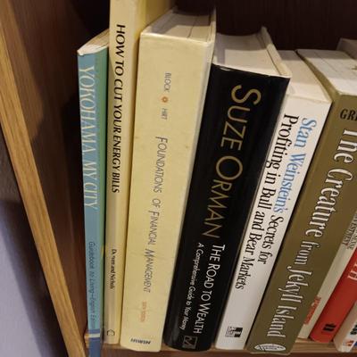 A LARGE COLLECTION OF BOOKS WITH VARIOUS SUBJECTS