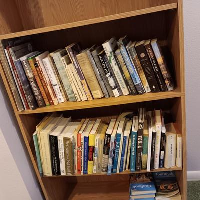 A LARGE COLLECTION OF BOOKS WITH VARIOUS SUBJECTS