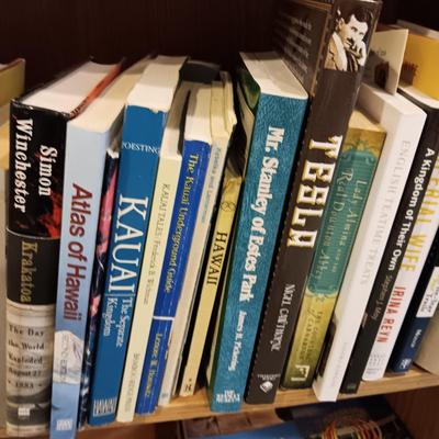 A LARGE COLLECTION OF BOOKS WITH VARIOUS SUBJECTS