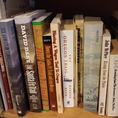 A LARGE COLLECTION OF BOOKS WITH VARIOUS SUBJECTS