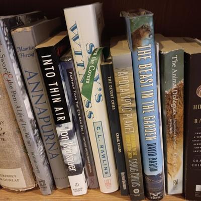 A LARGE COLLECTION OF BOOKS WITH VARIOUS SUBJECTS