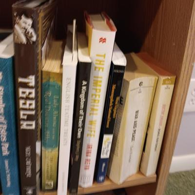 A LARGE COLLECTION OF BOOKS WITH VARIOUS SUBJECTS