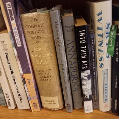 A LARGE COLLECTION OF BOOKS WITH VARIOUS SUBJECTS