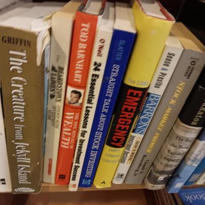 A LARGE COLLECTION OF BOOKS WITH VARIOUS SUBJECTS