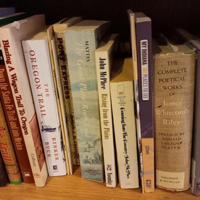 A LARGE COLLECTION OF BOOKS WITH VARIOUS SUBJECTS