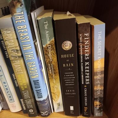A LARGE COLLECTION OF BOOKS WITH VARIOUS SUBJECTS