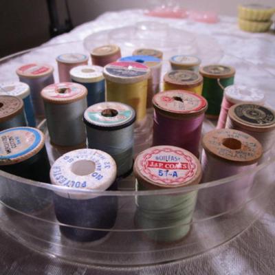Thread caddy with 21 spools of thread