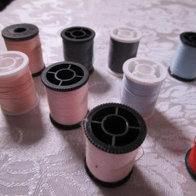 24 small spools of thread