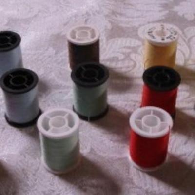 24 small spools of thread