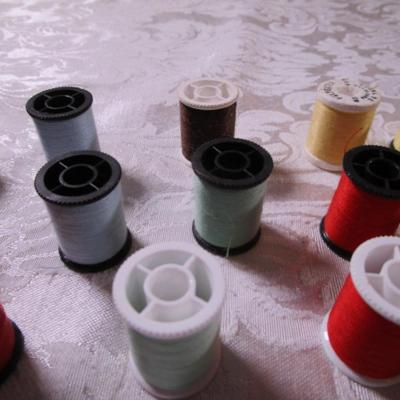 24 small spools of thread