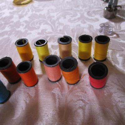 38 mini spools of thread