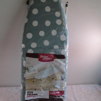 Folding tabletop ironing board with cover