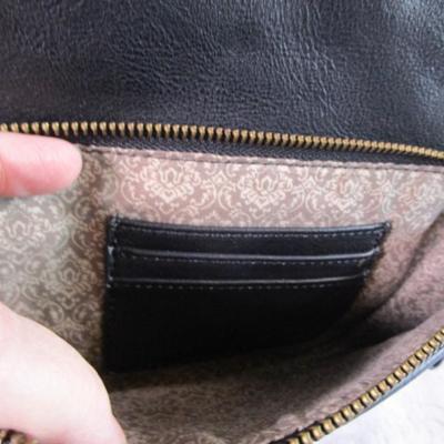 Black lined mini backpack