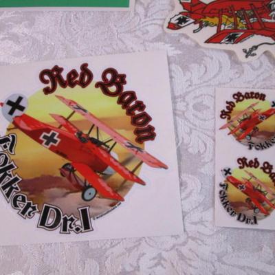 Various stickers and 1 postcard