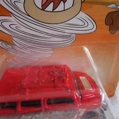 2 Hot Wheels cars, 1 Mickey Mouse, 1 Taz