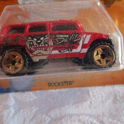 2 Hot Wheels cars, 1 Mickey Mouse, 1 Taz