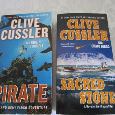 2 Clive Cussler novels, paperback