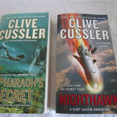 2 Clive Cussler novels, paperback