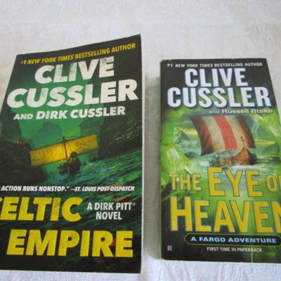 2 Clive Cussler novels, paperback