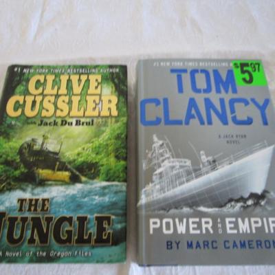 1 Clive Cussler, 1 Tom Clancy novel, both hardback
